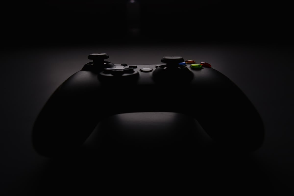 Neon gaming setup with keyboard and ambient lighting